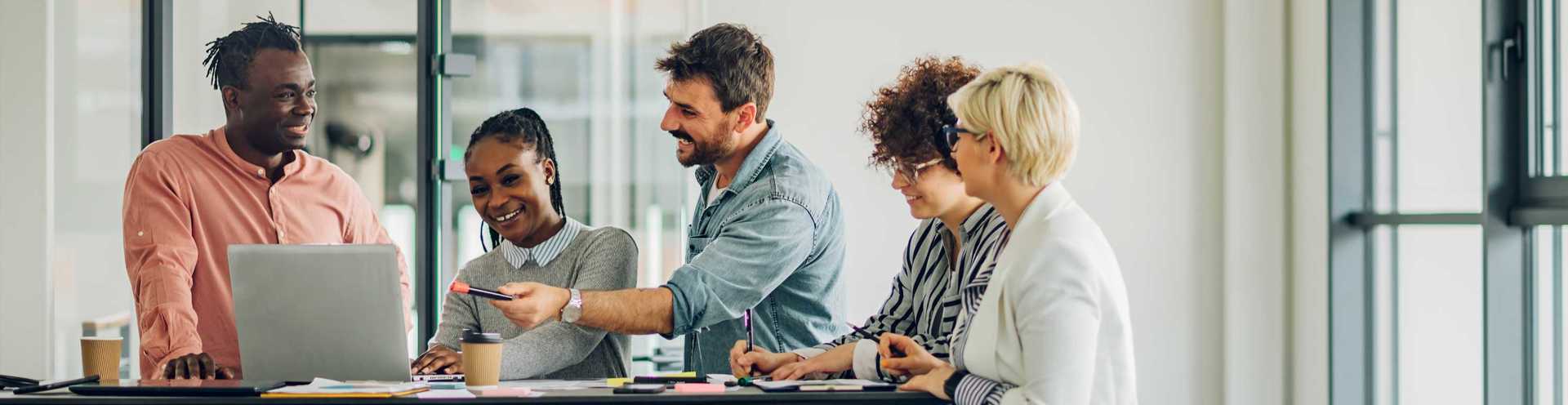 Business Planning - Business Banking - Team of Professionals Working on Project in an Office