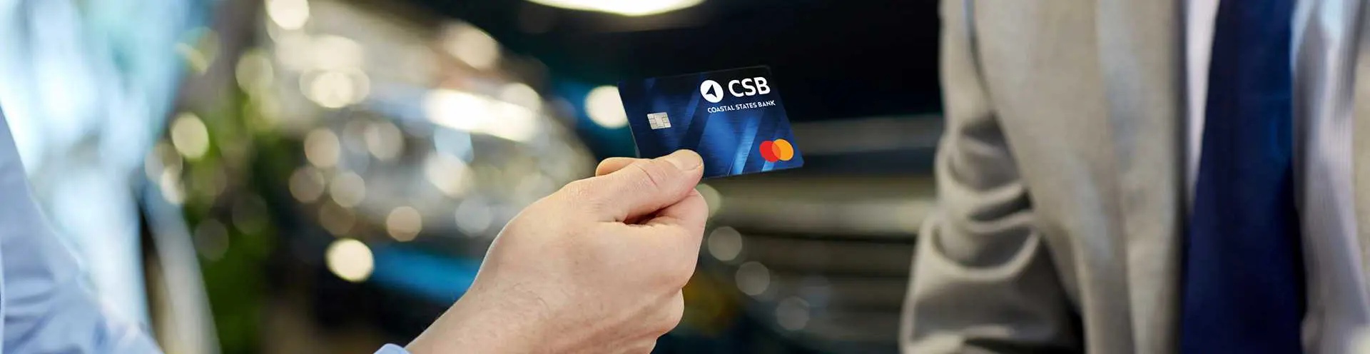 Business Credit Card - Person Paying with CSB Credit Card at Establishment 